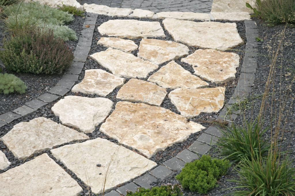 Reinigung Basel wege gartenwege plattenwege natursteinplatten sandsteinplatten steinplatten polygonalverband schotter kies einfassungen kanten bodenbelaege wegebelaege